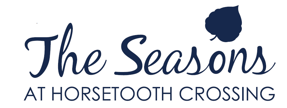 The image is a logo for "The Seasons at Horsetooth Crossing".